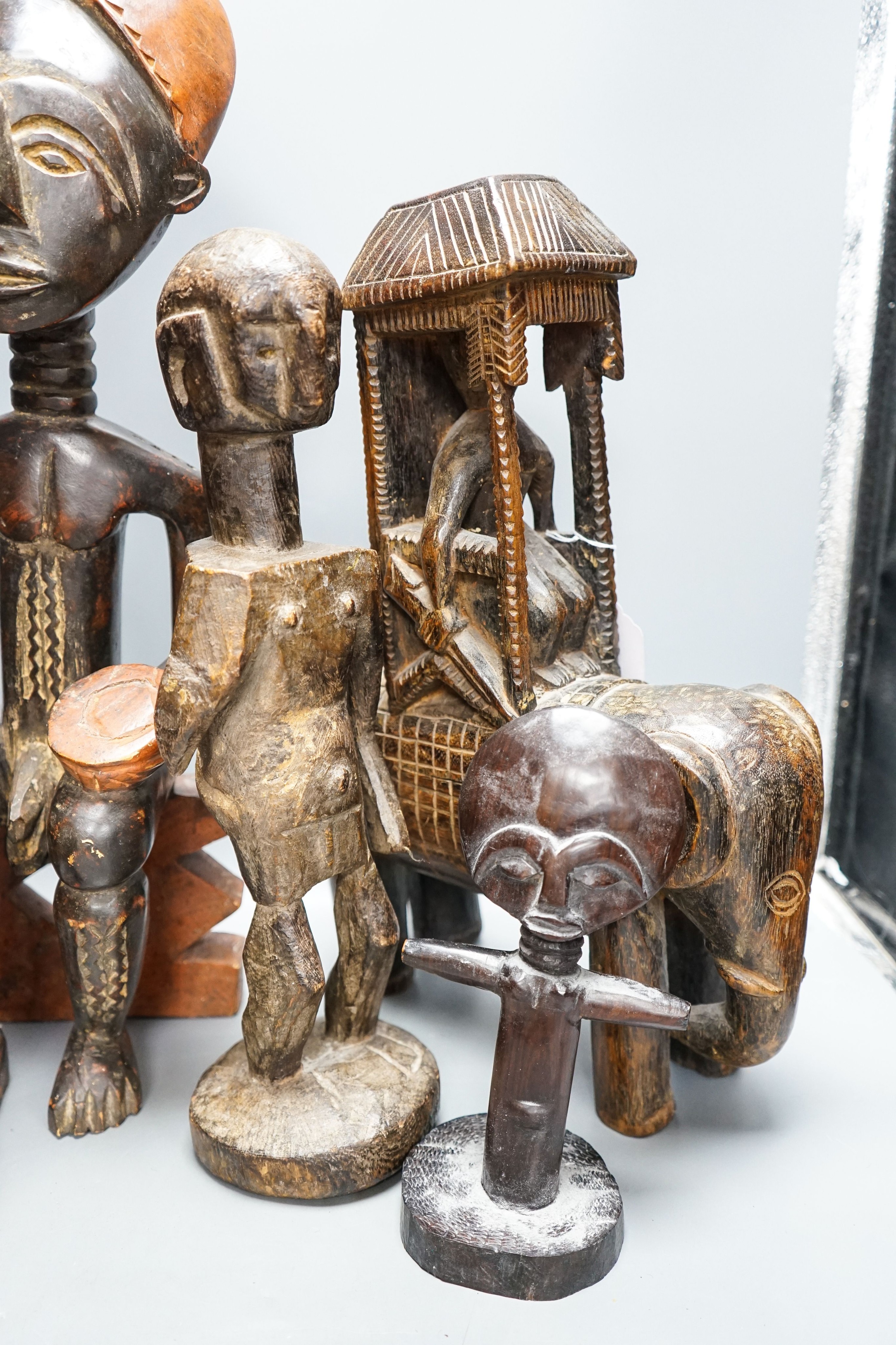 A group of African tribal carvings 53cm